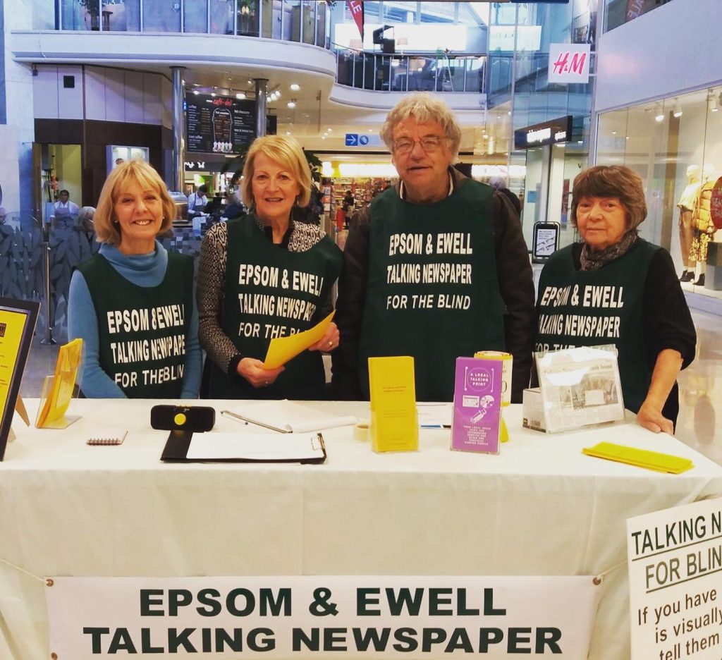 Photograph of the volunteers on a stall in the Ashley centre.